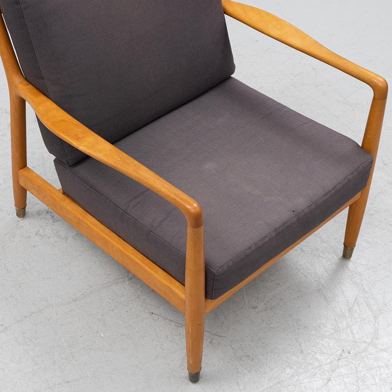 Folke Ohlsson, a beech 'USA-143' armchair, designed in 1953.