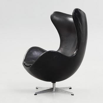An Arne Jacobsen black leather 'Egg' chair, Fritz Hansen, Denmark 1960's.