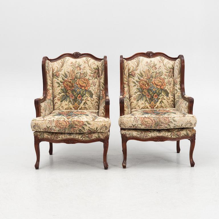 A pair of Louis XV-style armchairs, mid 20th Century.