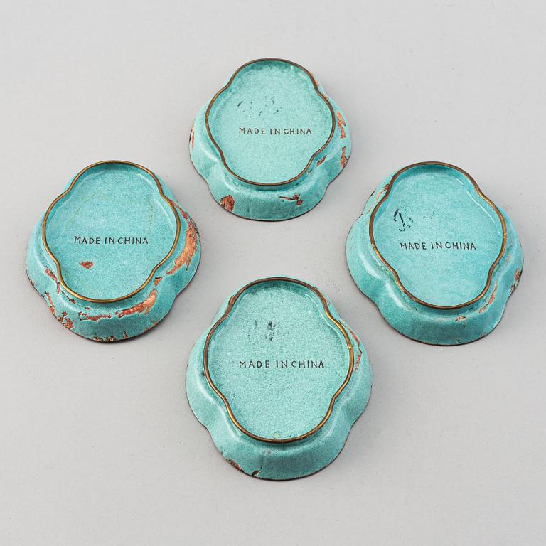 A set of 23 enamel on copper dishes, China, early 20th Century.