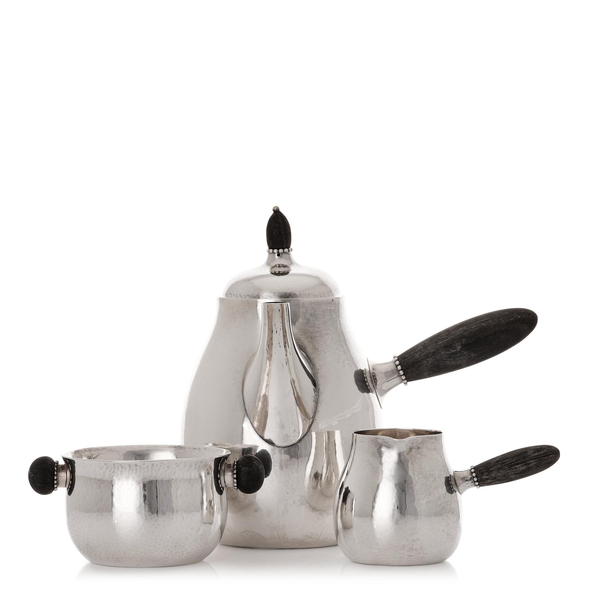 Georg Jensen, a set of three pieces of sterling coffee service, Copenhagen 1925-44 (the sugar bowl 1925-33), design nr 80 A and B.