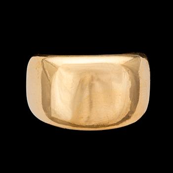 A Cartier gold ring.