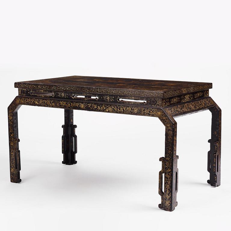 A Chinese painted black lacquer low table, Qing dynasty.