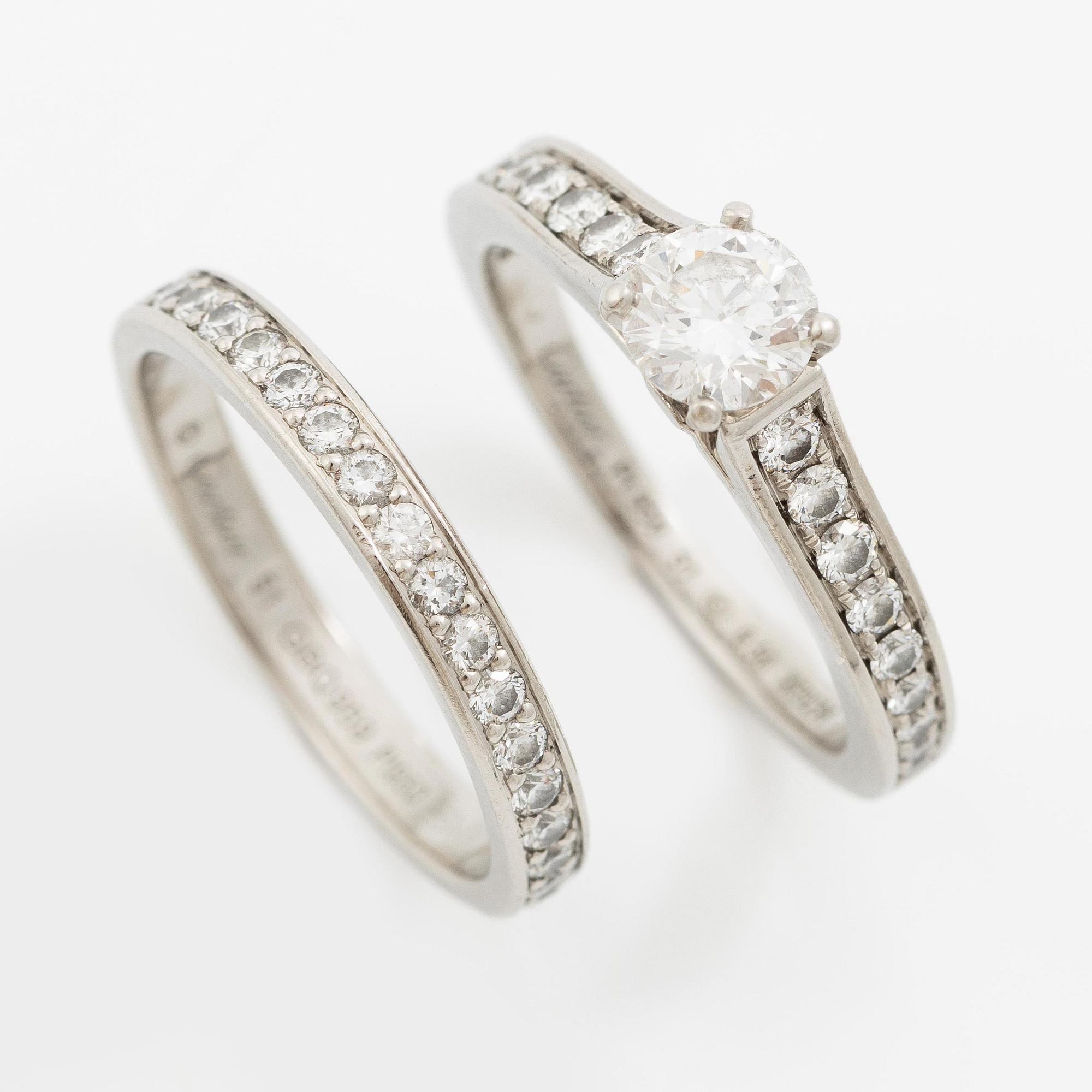 Cartier two rings platinum with round brilliant-cut diamonds.