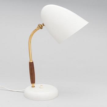 A mid-20th century tablelamp for Stockmann Orno, Finland.