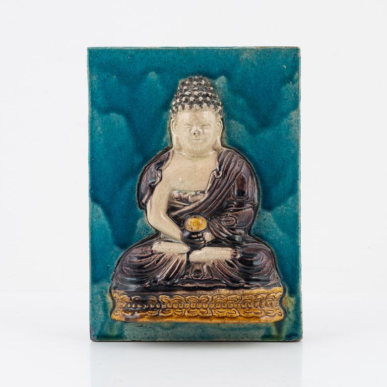 A Chinese wall placque with a budda, 20th Century.