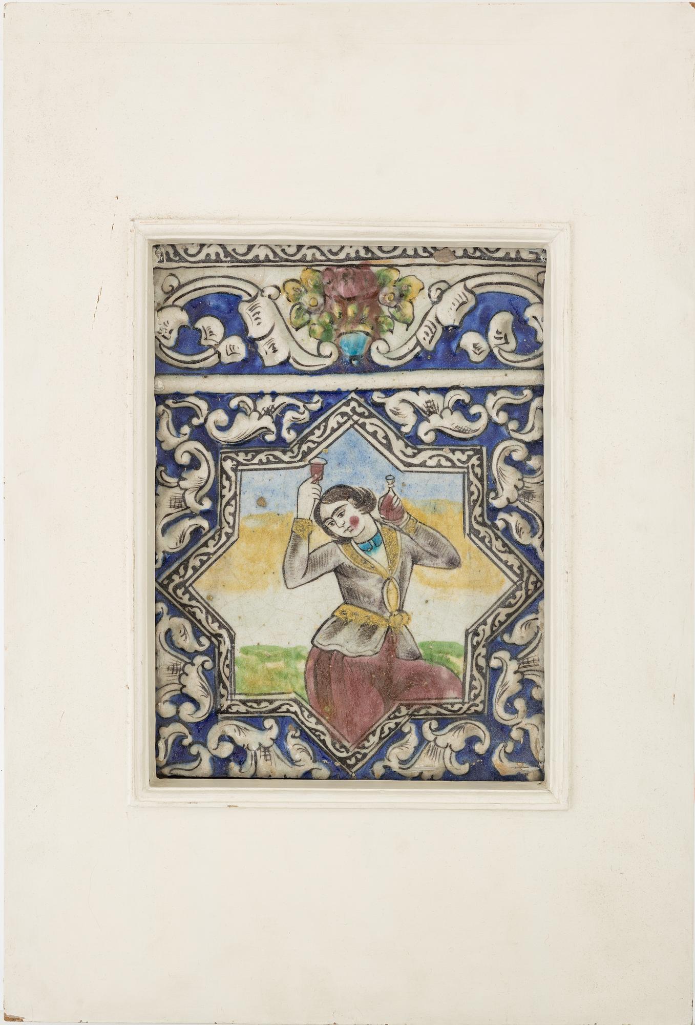 A Persian (Iranian)  tile, glazed pottery, Qajar dynasty, 19th century.
