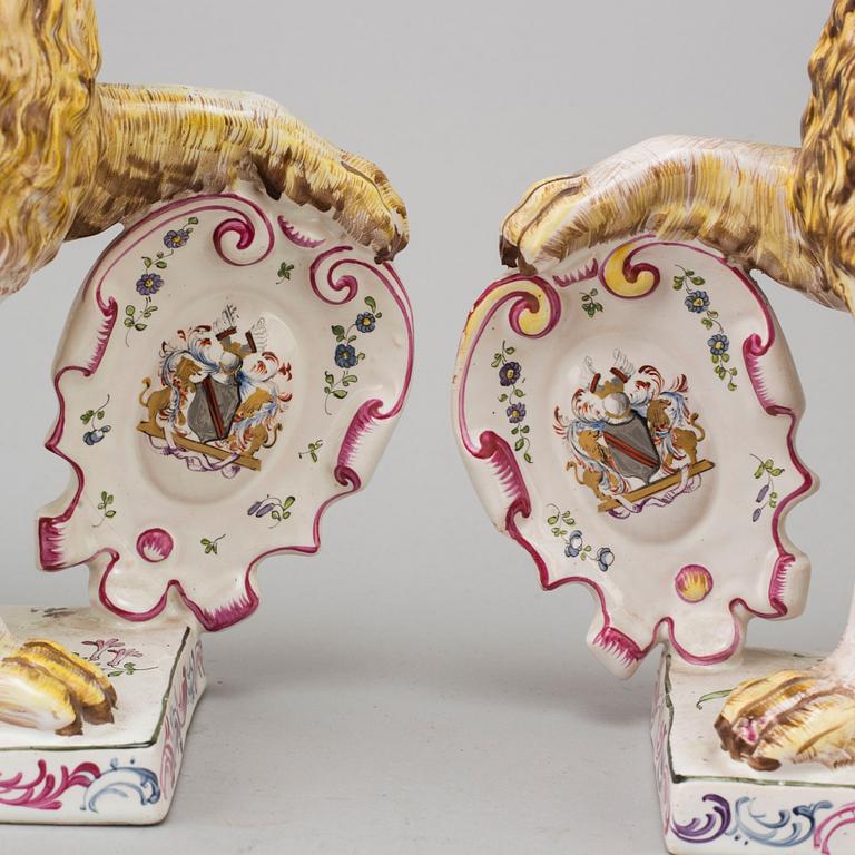 A PAIR OF FRENCH FAYENCE BOOK ENDS, 20th century.