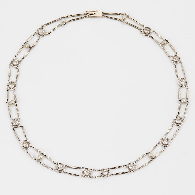 A NECKLACE with round brilliant-cut diamonds and pearls.