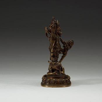 A Mongolian bronze figure of a Dharmapala, early 19th century.