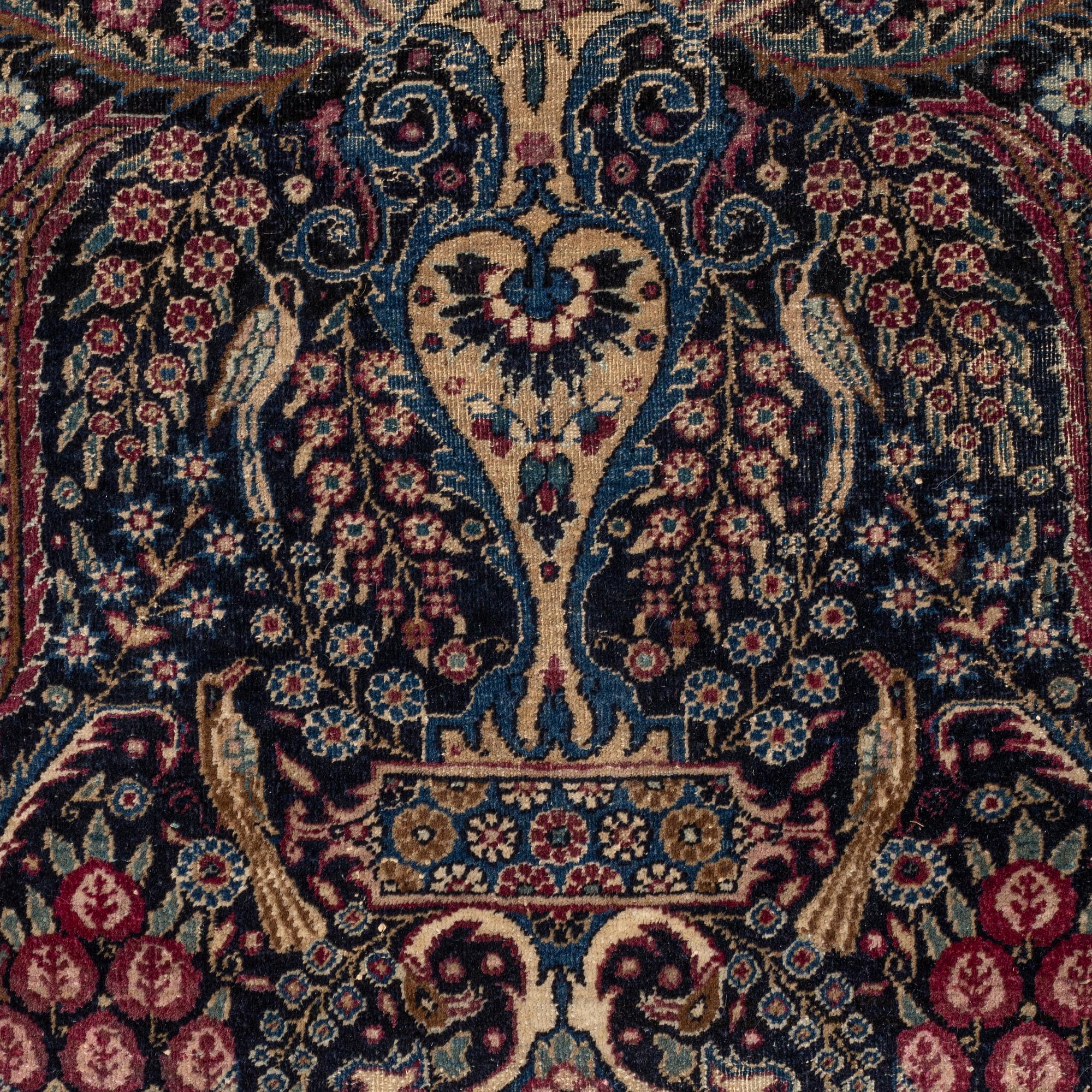 A carpet, a semi-antique Tehran, possibly, ca 220 x 142 cm.