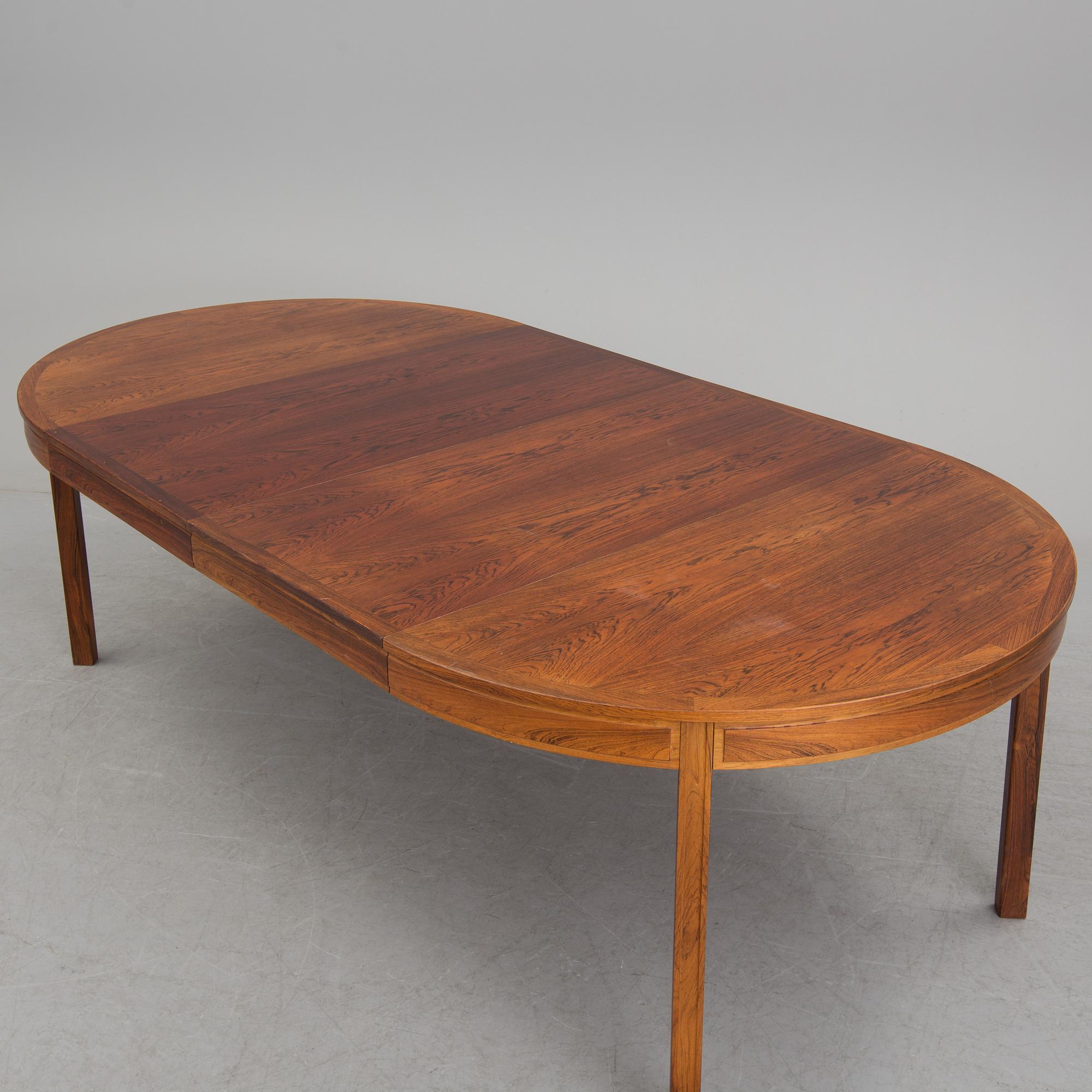 A rosewood dining table by Bertil Fridhagen for Bodafors.