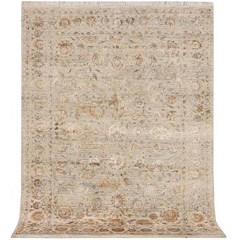 An Ushak Design, silk rug, a. 242 x 170 cm.