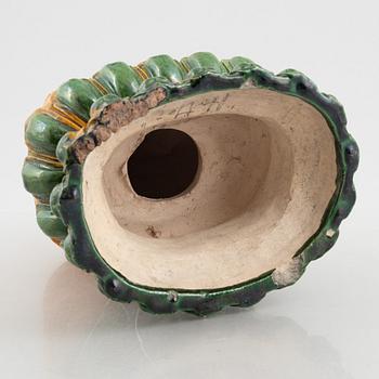 A ceramic Budai, China, 20th century.