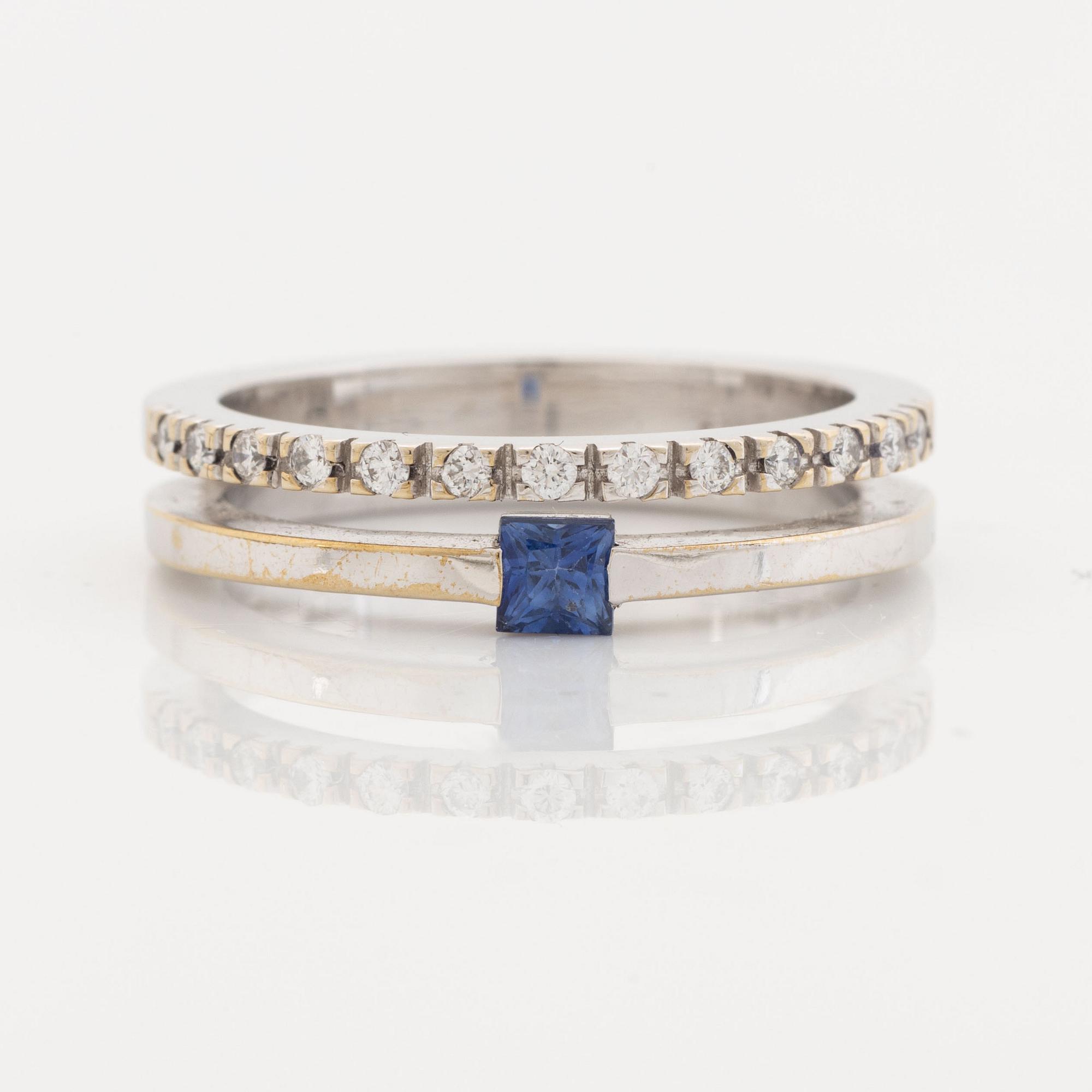18K white, brilliant cut diamond and sapphire.