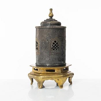 A silvered brass prayer container, Tibet, 20th century.