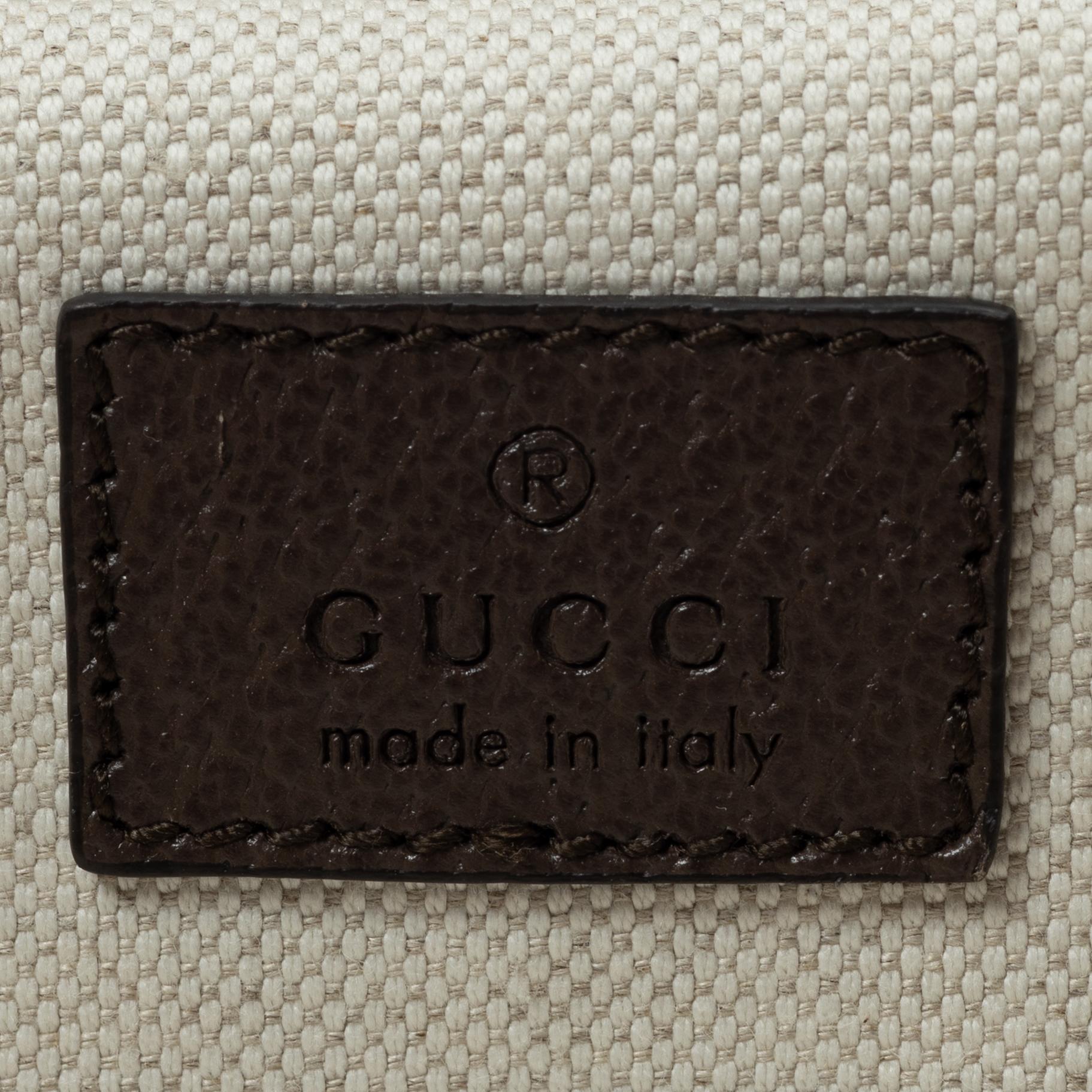 Gucci, suitcase / cabin bag.