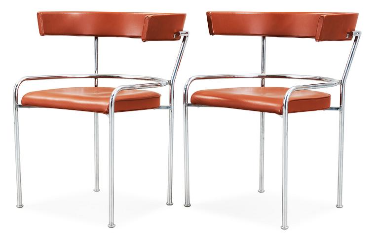 A pair of Gunnar Asplund chromed steel and leather armchairs by Källemo, Sweden post 1988.