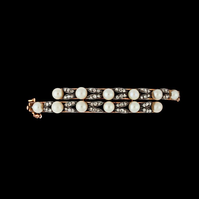 A natural pearl and rose cut diamond bangle, c. 1880.