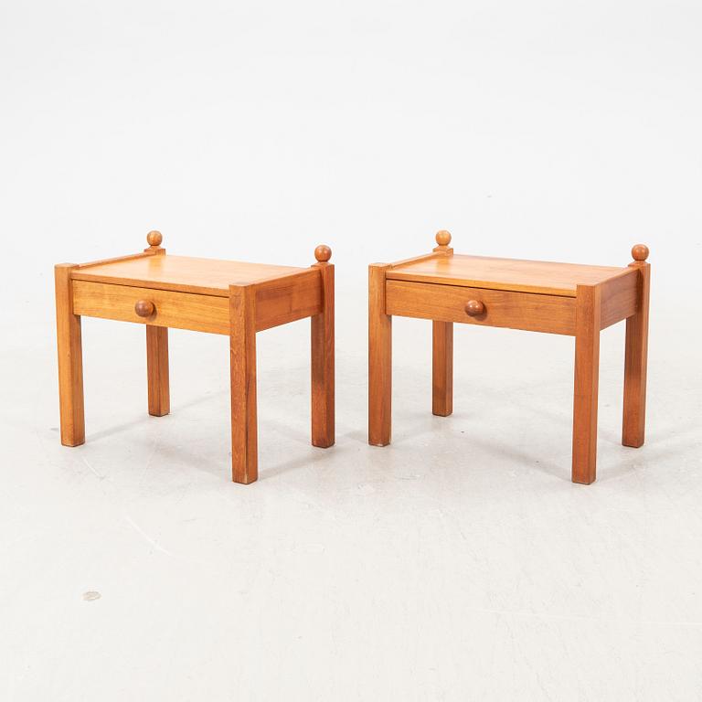A pair of 1960s walnut bedside tables.