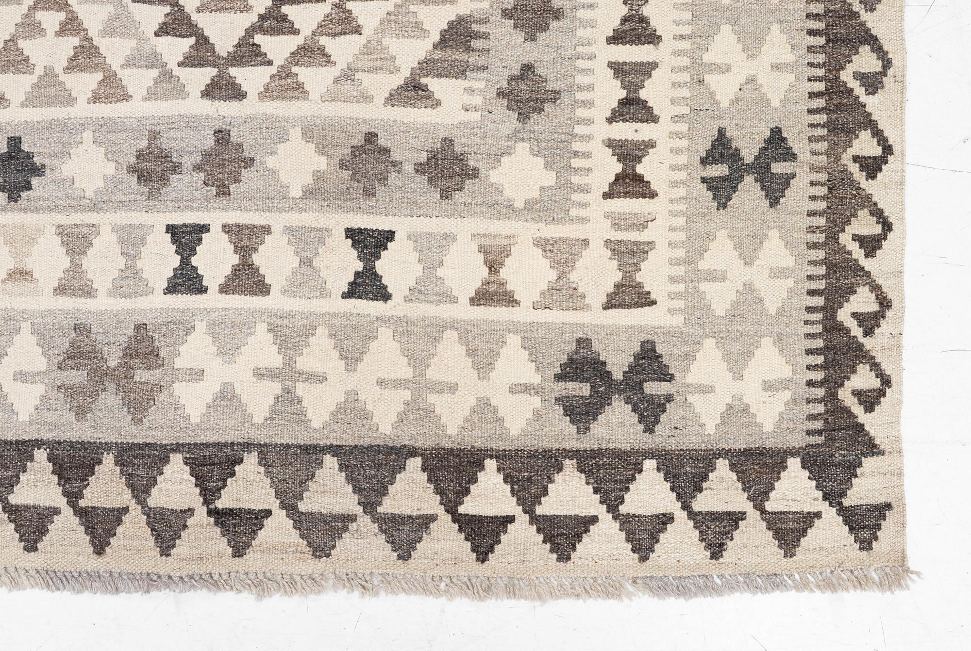 A Kelim carpet, a. 295 x 200 cm.