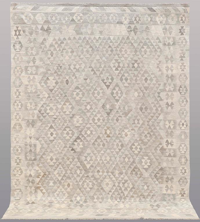 A carpet, kilim, ca 287 x 218 cm.