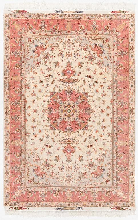 Rug, Tabriz, approx. 305 x 203 cm.