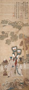 A hanging scroll of court attendants in a garden and with calligraphy, Qing dynasty.