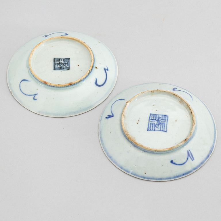 A set of 12 similar Chinese blue and white porcelain small dishes, late Qing dynasty, around the year 1900.