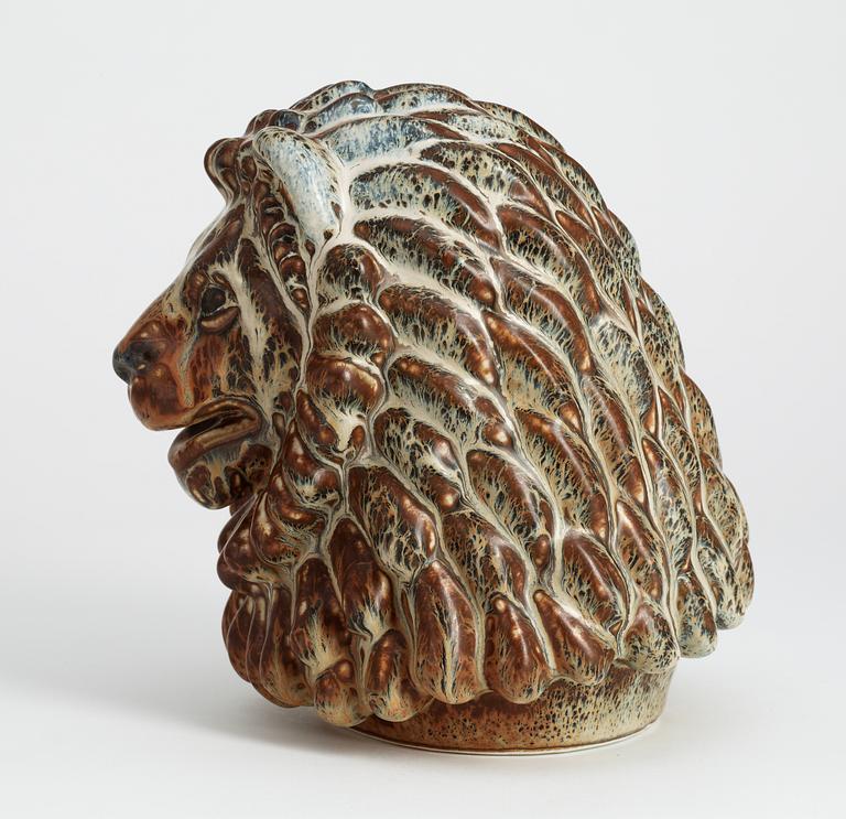 A Gunnar Nylund stoneware figure of a lion's head, Rörstrand.