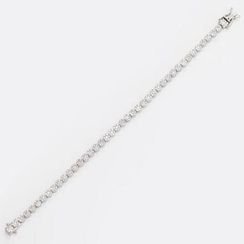 Tennisrannekoru, 18K valkokultaa, timantteja yht noin 3.44 ct. Suomalaiset leimat.