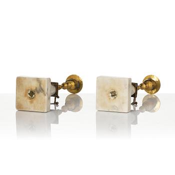 A pair of late Gustavian marble and gilt brass candlesticks, late 18th century.