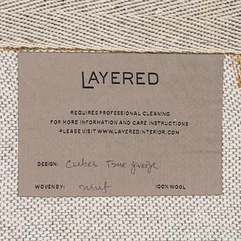 A 'Cubes' carpet, Layered, c. 270 x 180 cm.