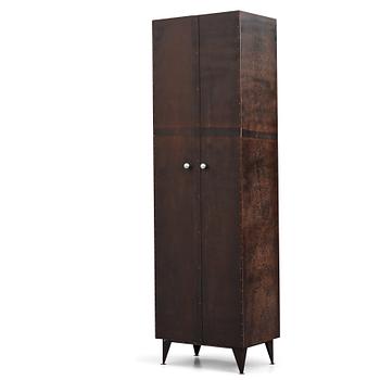 A contemporary patinated metal cabinet.