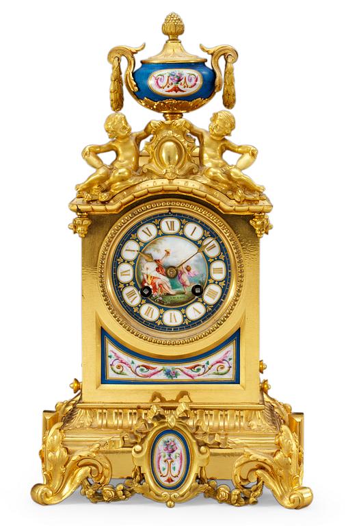 A French 19th cent mantel clock, marked "Sèvres" and signed "S.W.Lom".