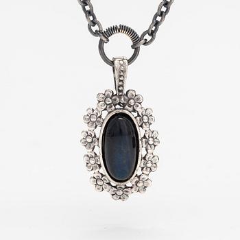 Jorma Laine, A silver necklace "Lemmikki" witha spectrolite. Turun Hopea, Turku.