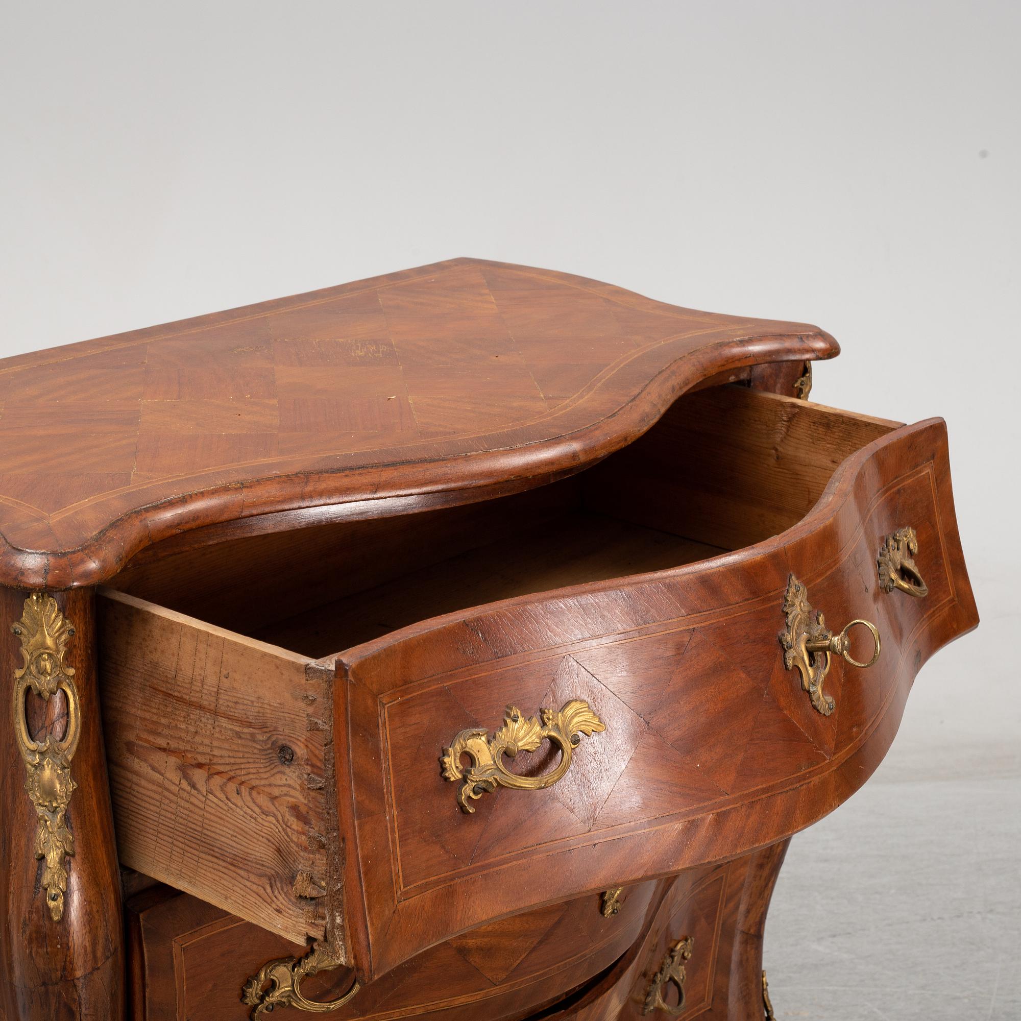 A 19th Century rococo style dresser.