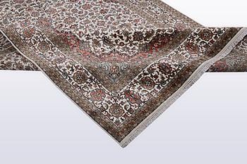A carpet, silk Kashmir, ca 260 x 172 cm.