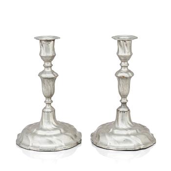 A pair of Rococo pewter candlesticks by C Sauer 1749.