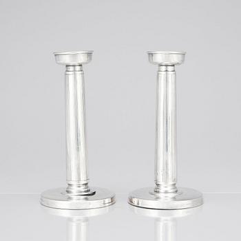 Gustaf Janson, a pair of sterling candlesticks, C.G Hallberg Stockholm 1961.