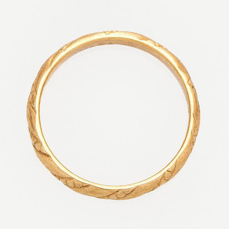 Kalevala Koru, ring "Halikon Lampolan kierresormus", 18K guld, Helsingfors 1998.