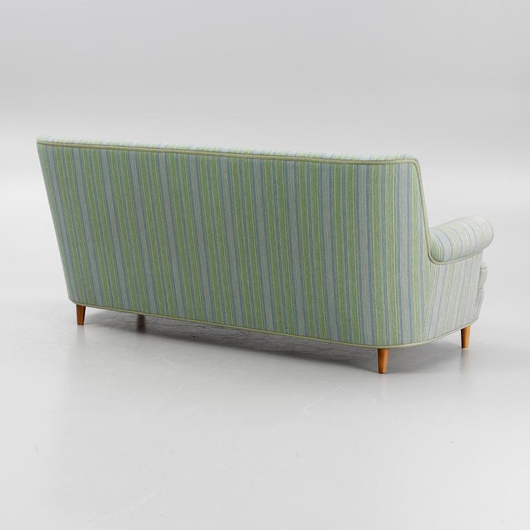 Carl Malmsten, a 'Hemmakväll' sofa.