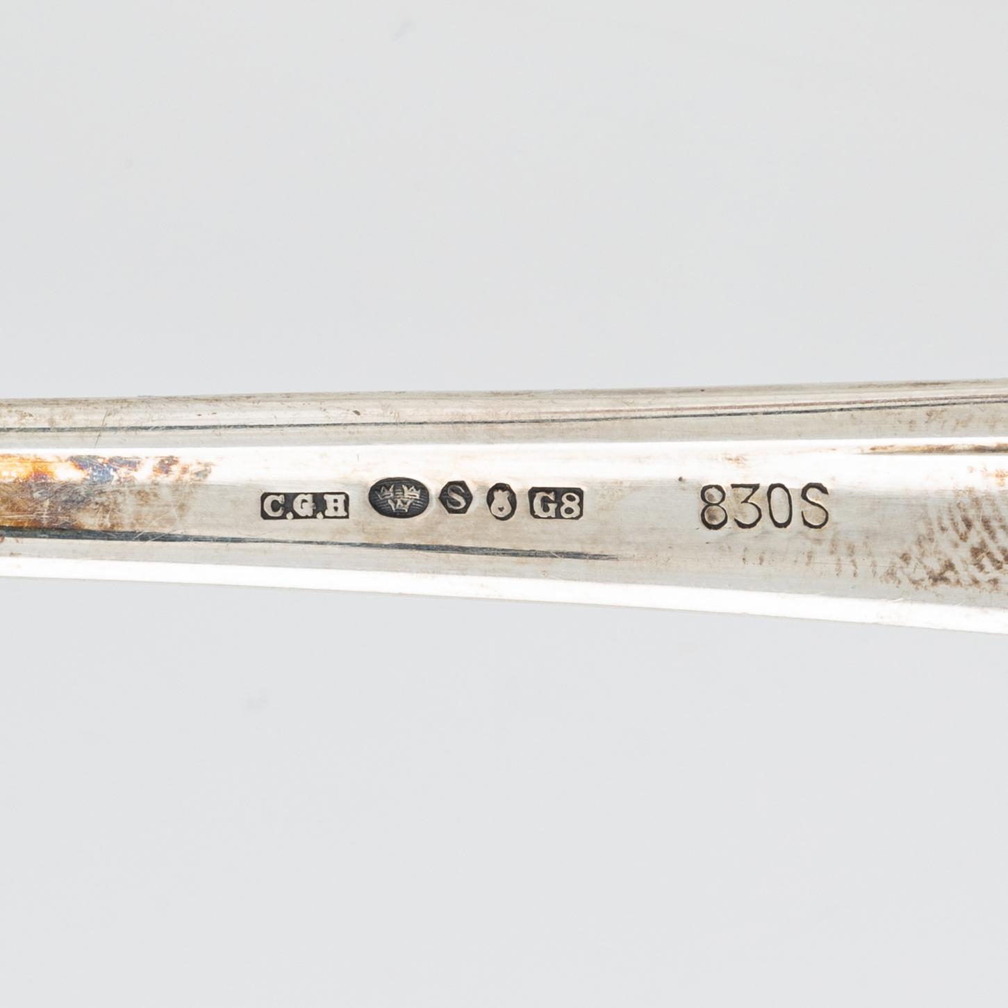 A 120- piece silver cutlery, bearing Swedish import marks, including CG. Hallberg, Stockholm, 1932.