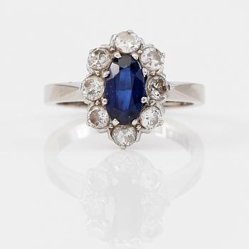 RING, 18 k vitguld, Teboon, Nyköping 1976, briljantslipade diamanter och safir. Vikt 4,1 g.