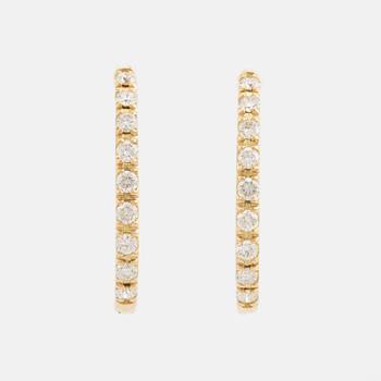 Brilliant cut diamond hoop earrings.