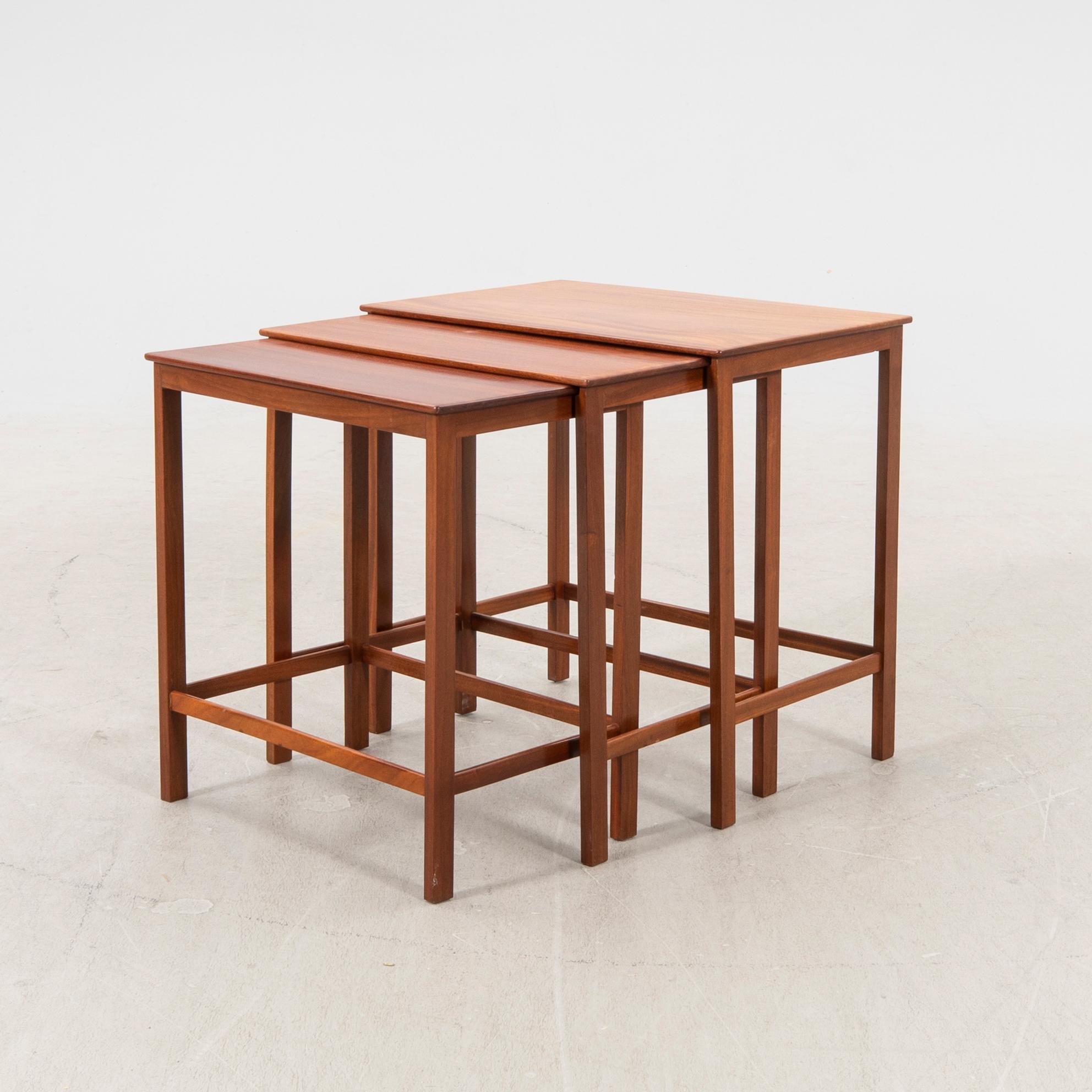 Jacob Kjaer, a mahogany nesting table later part of the 20th century.