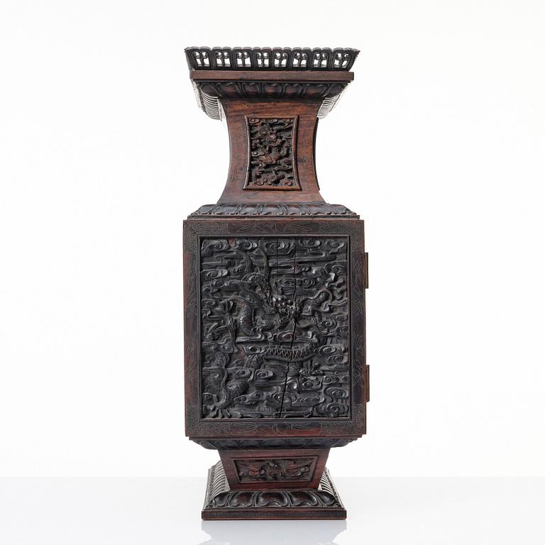 A hardwood dragon cabinet, Qing dynasty 18/19th Century.