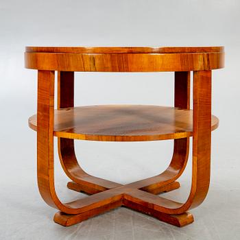 An Art deco style walnut coffee table alter part of the 19th century.