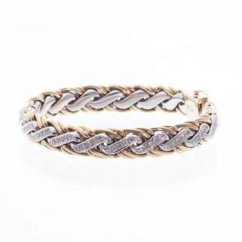 ARMBAND, 18K vitt- ovh gult guld, 8/8-slipade diamanter. Vikt ca 76,5 g.