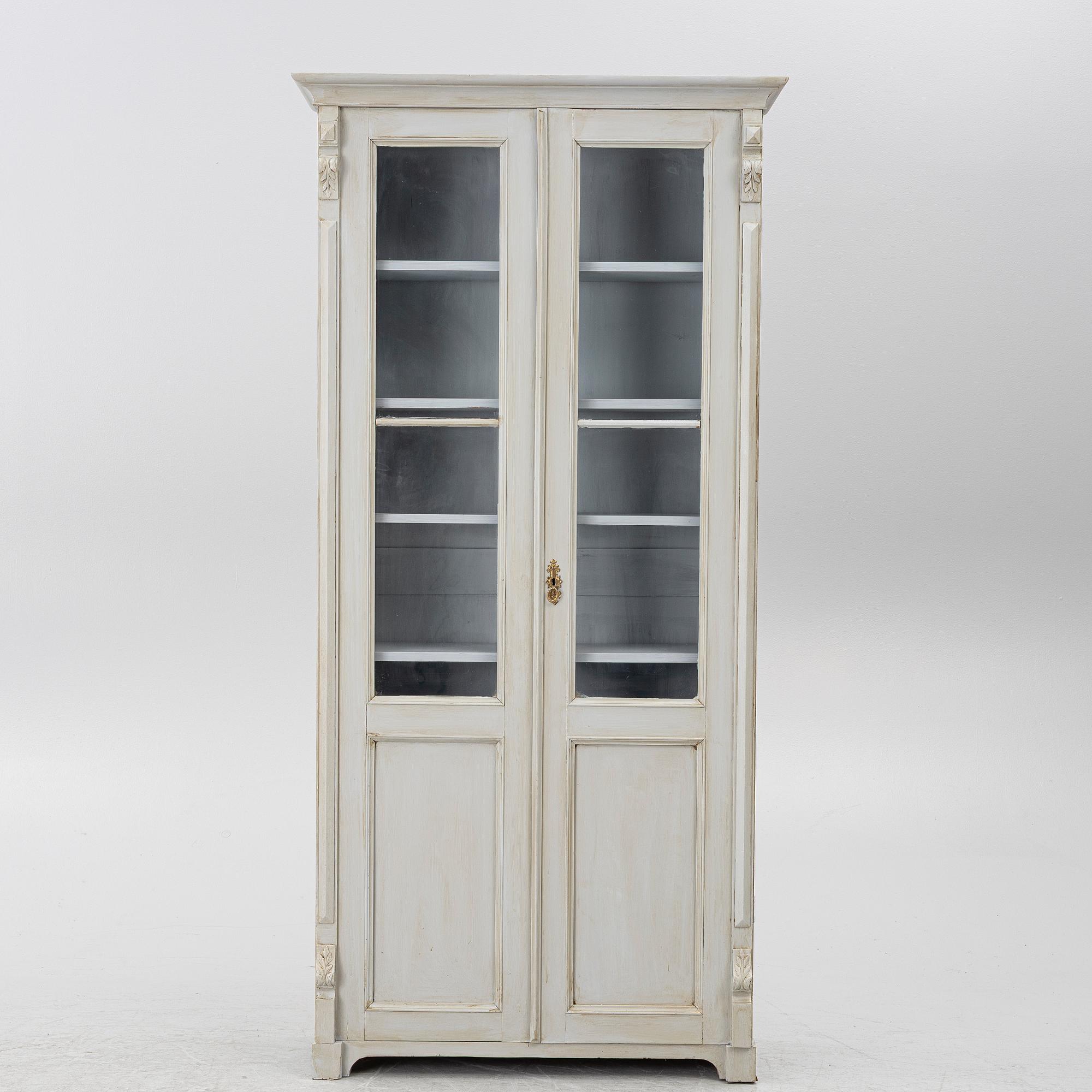 Display cabinet, circa 1900.